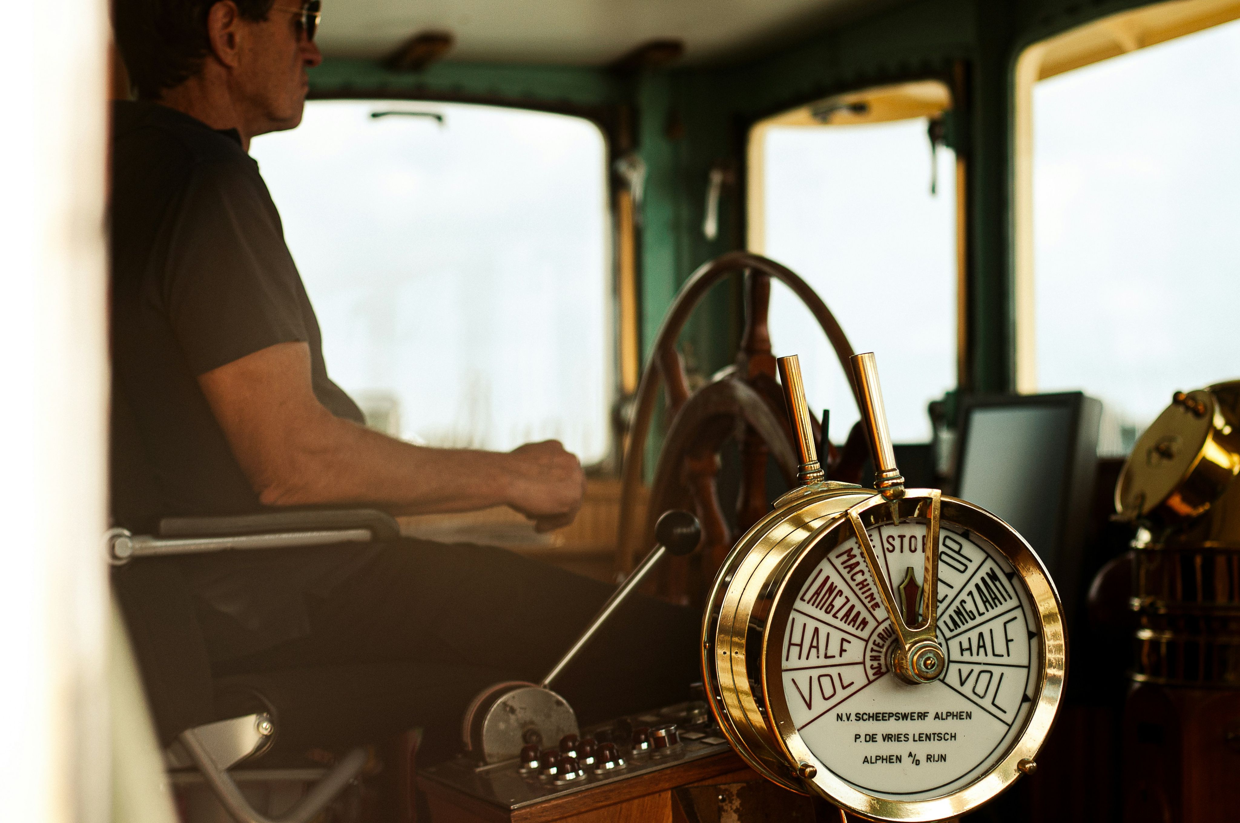 Ship captain operating vessel controls