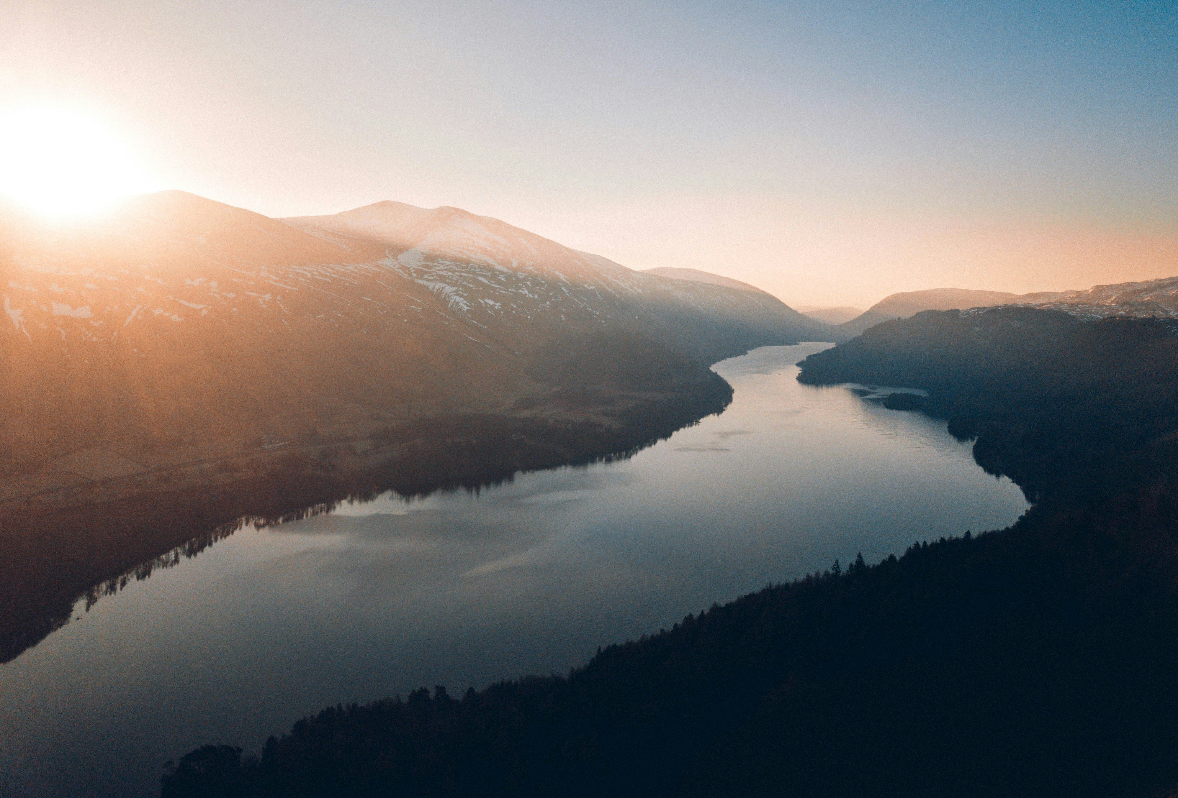 River landscape surrounded by mountains